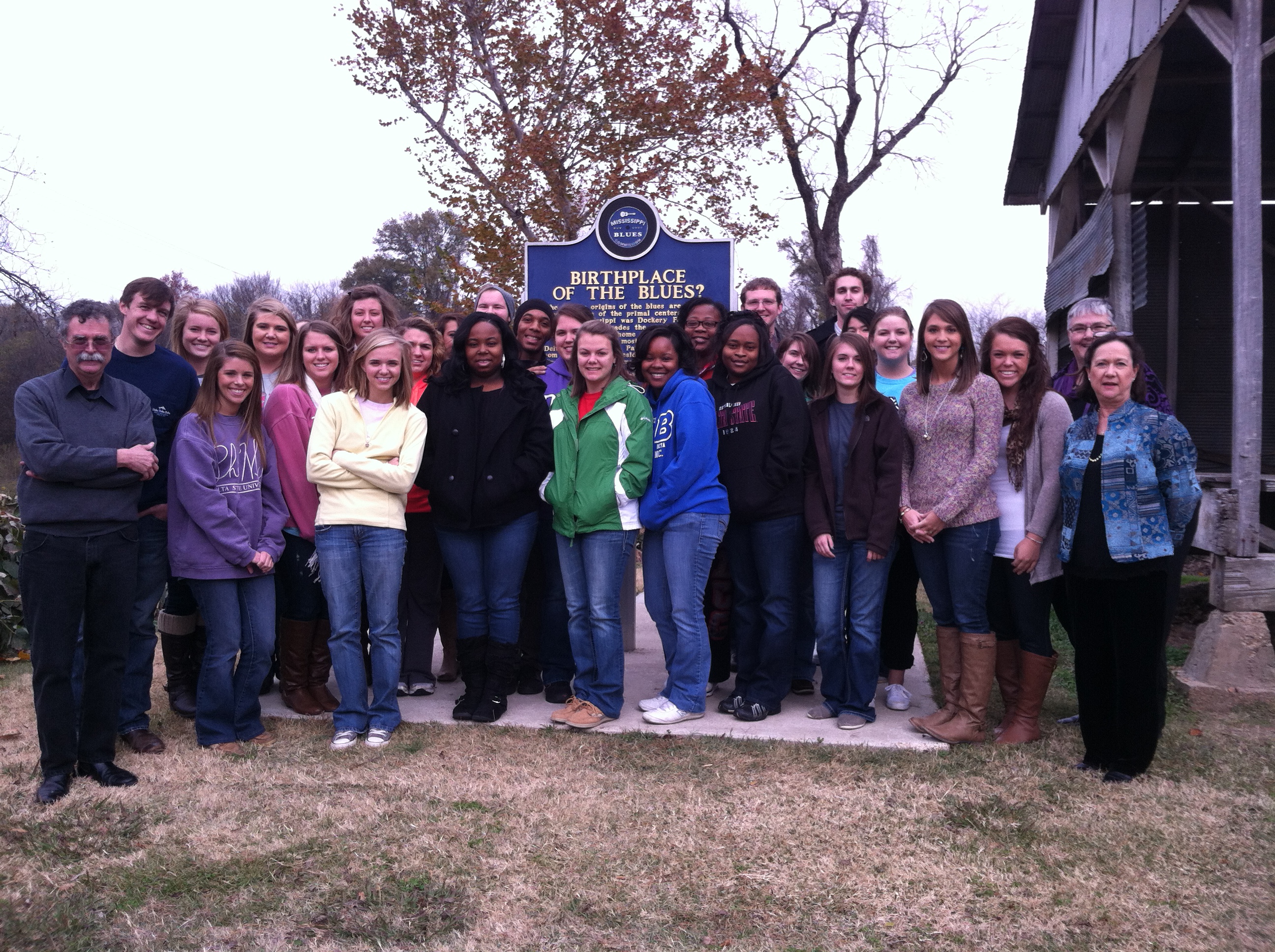 PHOTO:  The freshman class of the Robert E. Smith School of Nursing in front of the Mississippi Blues Trail marker at Dockery Farms.  Photo by Lee Aylward.